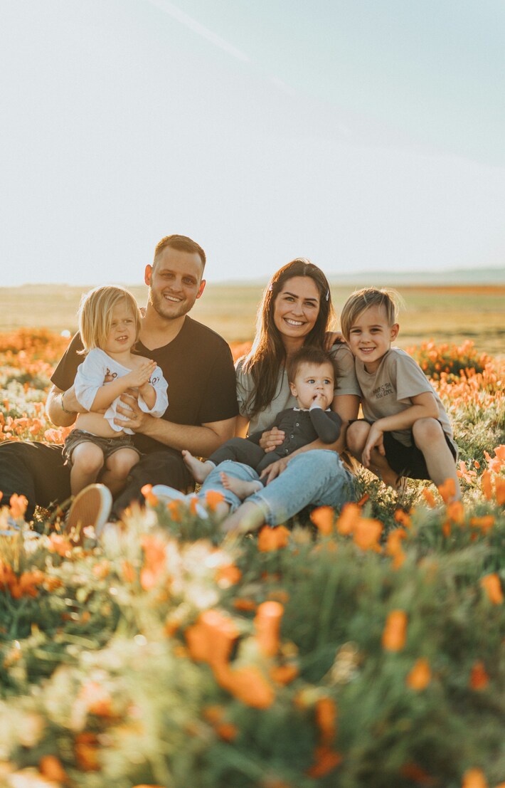 Young parents with three children